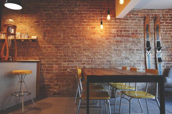 Exposed interior brick wall shelf